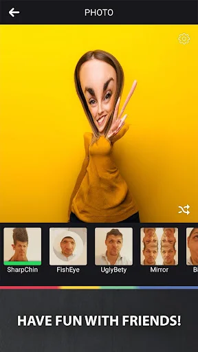 Funny Camera app with elongated face effect on yellow background, filter carousel showing photo editing options
