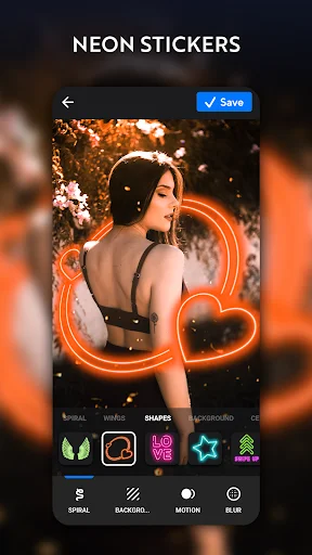 Neon stickers feature displaying heart-shaped orange glow sticker overlay on portrait photo