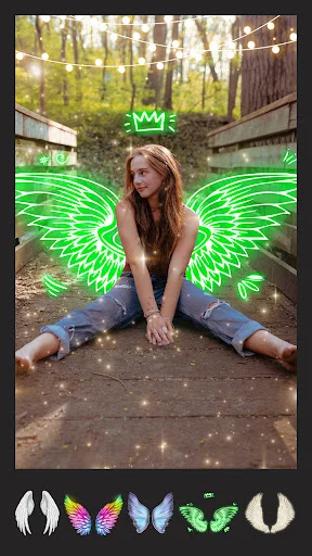 Pixlab neon wings effect: Green glowing angel wings added to woman with crown and sparkle elements, customizable wing styles
