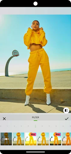 Photo Pea filter selection interface showing multiple filter previews applied to a fashion photo